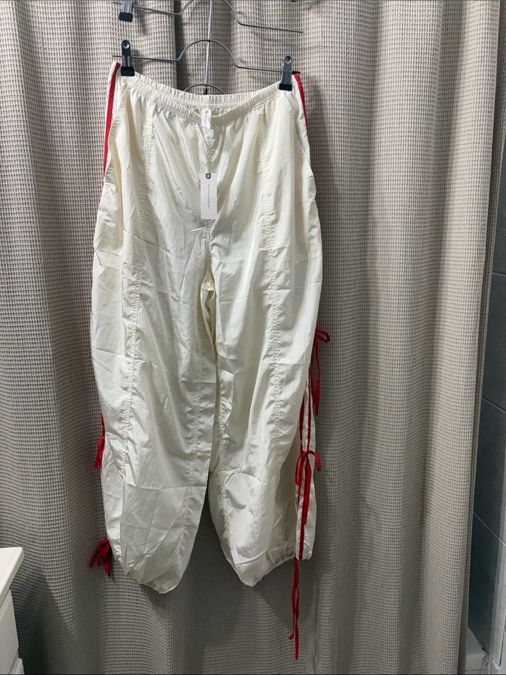 Anthropologie Cream parachute  Pants with Red Side Ties